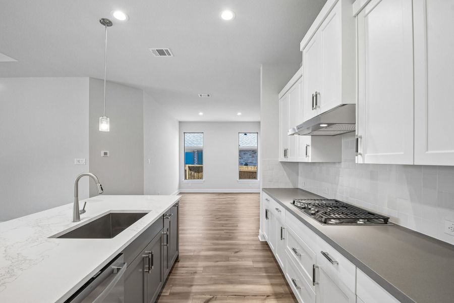 Furnished interior view inside a new home in 6 Creeks, Kyle (Image 6).