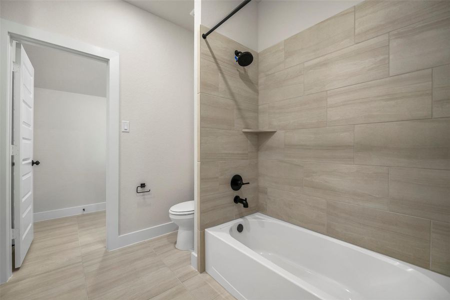 Furnished interior view inside a new home in Bridgeland 80′, Cypress (Image 10).