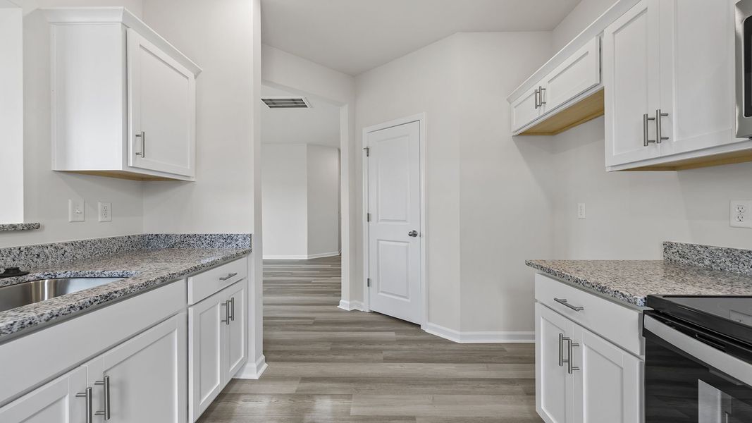 Furnished interior view inside a new home in Tanglewood Townes, Greenville (Image 8).