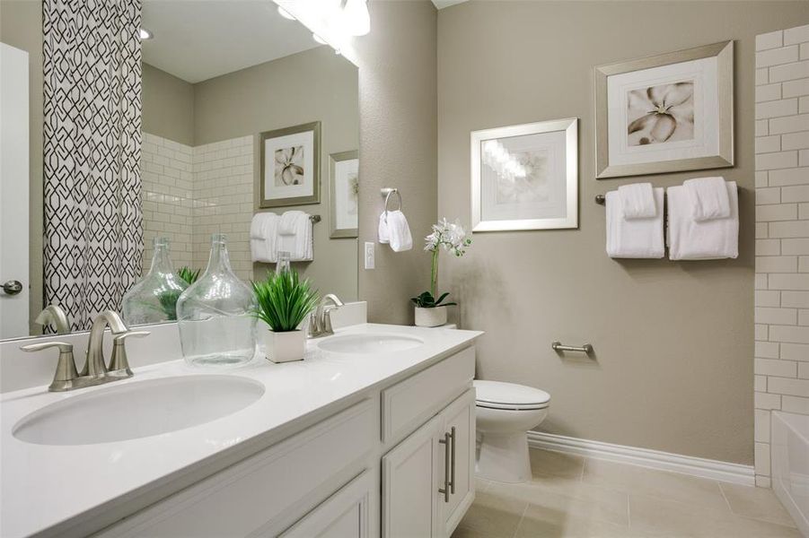 Stylish secondary bath with high-end fixtures *Model representation Stylish secondary bath with high-end fixtures *Model representation