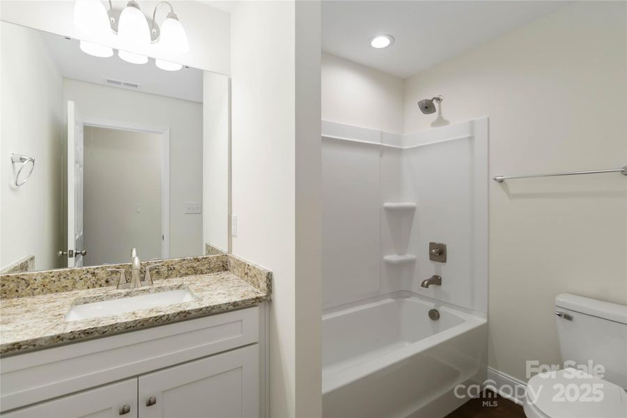 Furnished interior view inside a new home in , Monroe (Image 12).