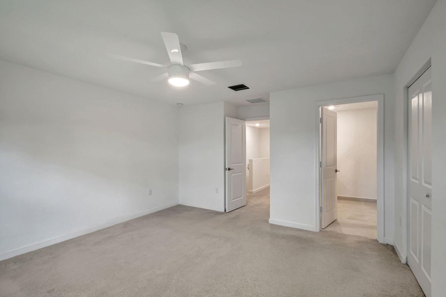 Primary Bedroom towards hall & Bathroom1