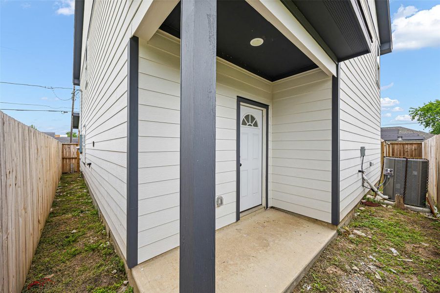 Exterior details and patio area of a home in , Houston (Image 4).