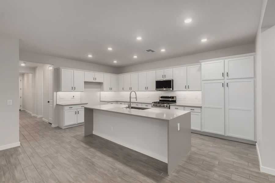 Furnished interior view inside a new home in Avanti at Granite Vista, Waddell (Image 8).