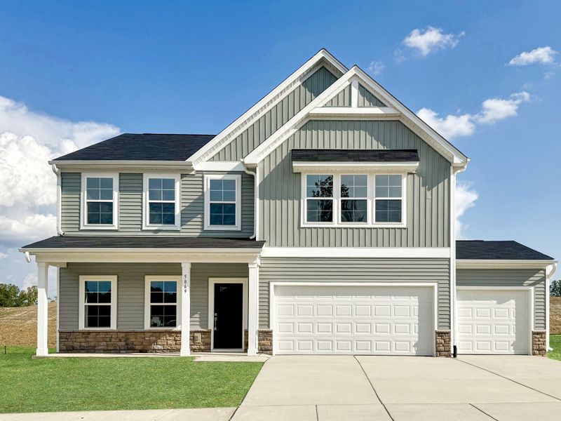 Front exterior of a new home in Stapleton, Clemmons, NC, highlighting curb appeal (Image 1). Front exterior of a new home in Stapleton, Clemmons, NC, highlighting curb appeal (Image 1).