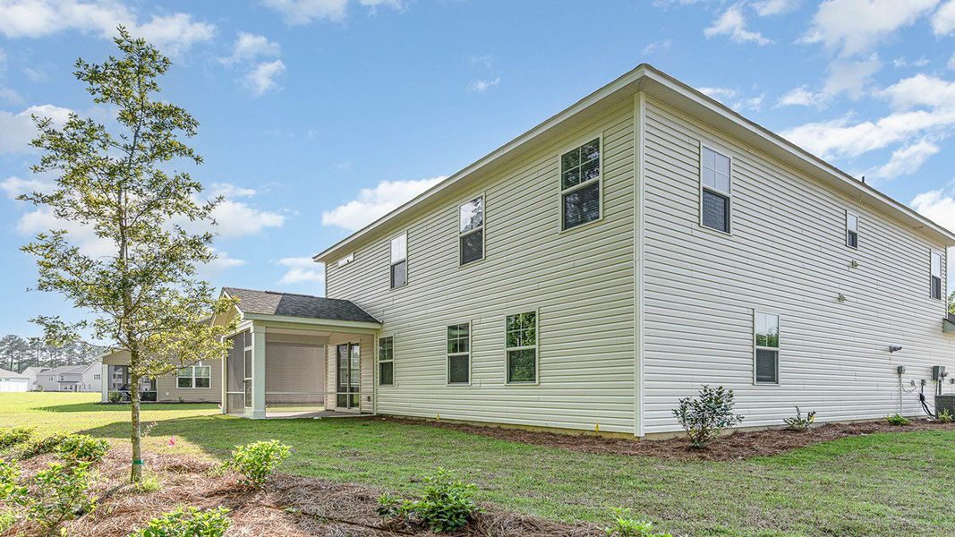 Representative exterior photo of a completed home built from the HARBOR OAK by D.R. Horton in Haven View, Murrells Inlet, SC (Image 19).
