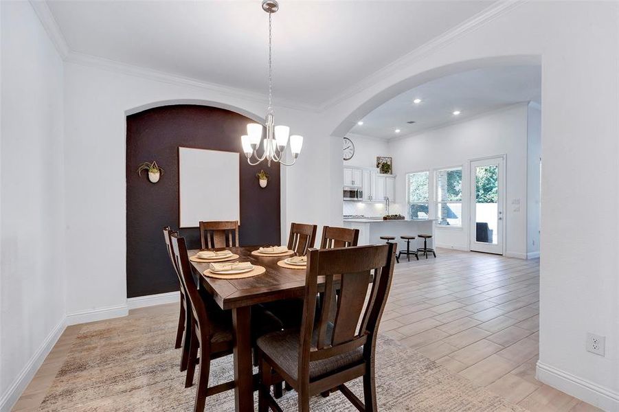 Dining room open to den. Perfect for entertaining.