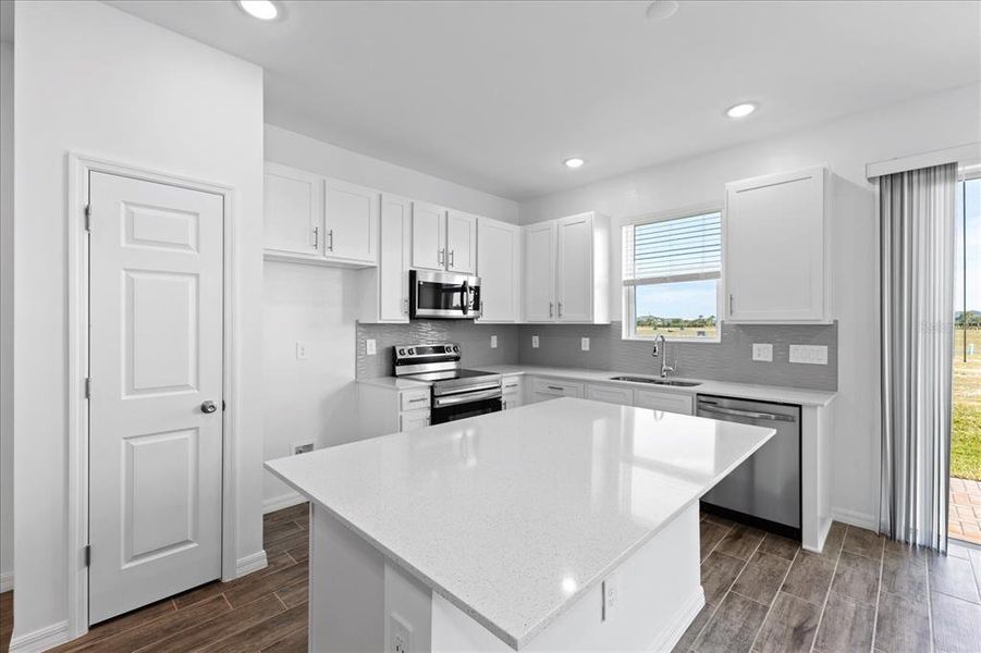 Furnished interior view inside a new home in , Orange City (Image 1).