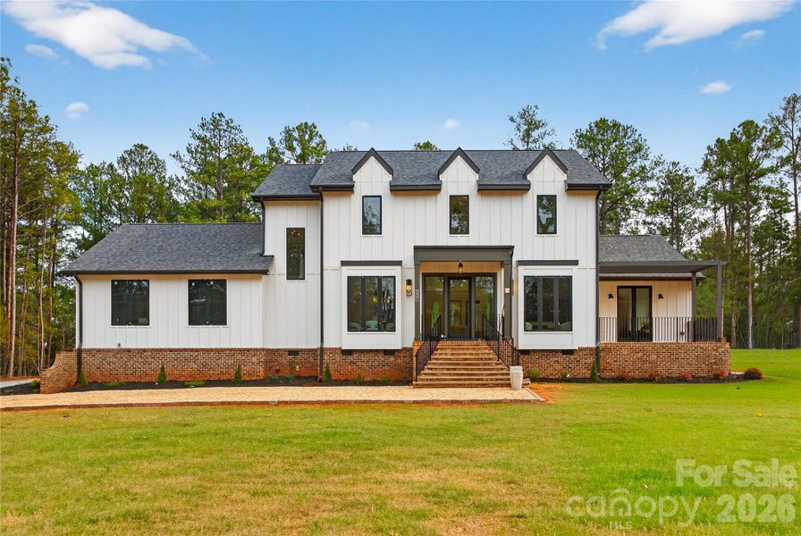 Front exterior of a new home in , Lancaster, SC, highlighting curb appeal (Image 25).