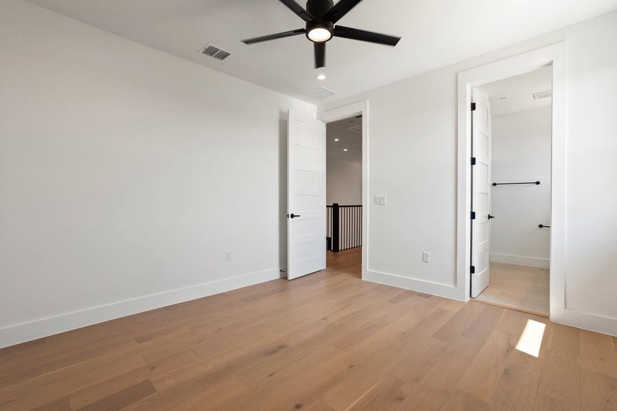 Spacious, unfurnished interior of a new home in Milky Way at River Place, Austin (Image 31).