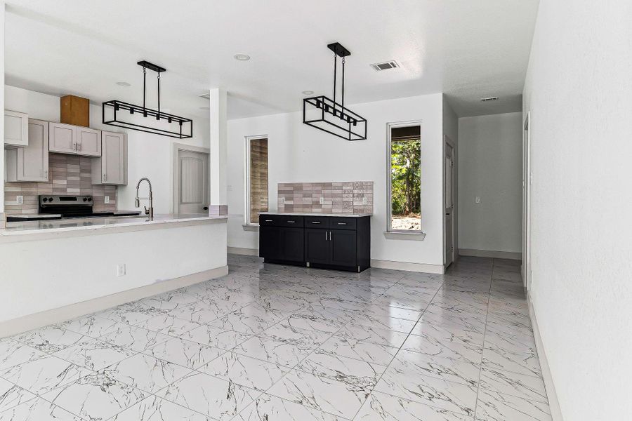 Furnished interior view inside a new home in , Livingston (Image 9). Furnished interior view inside a new home in , Livingston (Image 9).