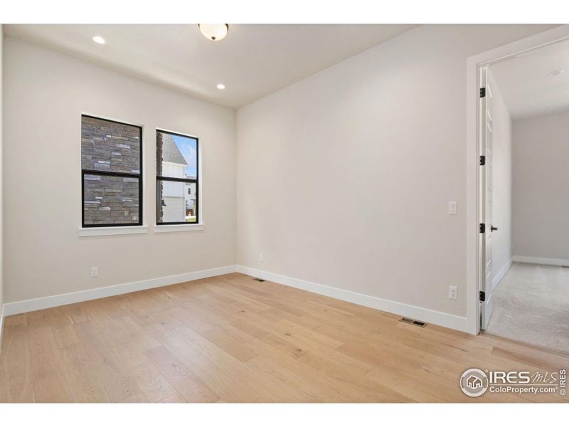 Spacious, unfurnished interior of a new home in The Fairways at RainDance, Windsor (Image 9).