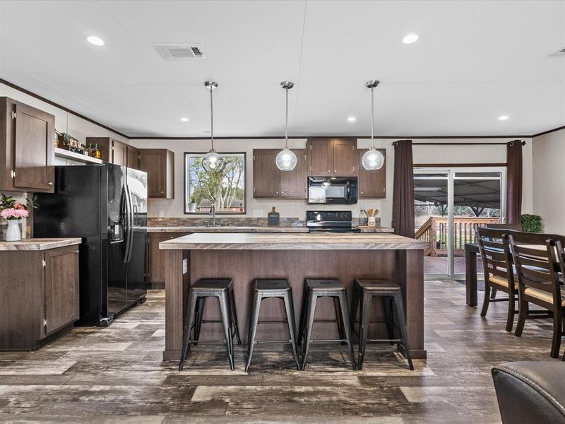 Open Concept kitchen with beautiful island and additional seating