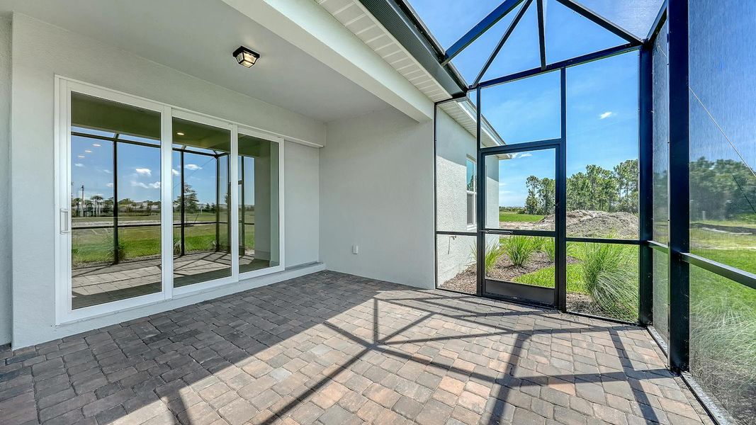 Exterior details and patio area of a home in Palmera Real Estate and Homes for Sale in Venice, FL - Neal Communities, Venice (Image 23). Exterior details and patio area of a home in Palmera Real Estate and Homes for Sale in Venice, FL - Neal Communities, Venice (Image 23).