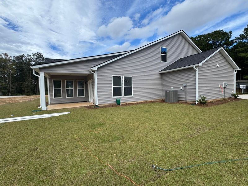 Front exterior of a new home in Central Estates, Summerville, SC, highlighting curb appeal (Image 6).