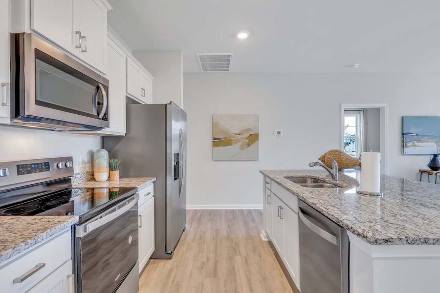Representative furnished interior of a home built from the TUSCAN by D.R. Horton in Westbrook Retreat Villas at Savannah Quarters, Pooler (Image 8).
