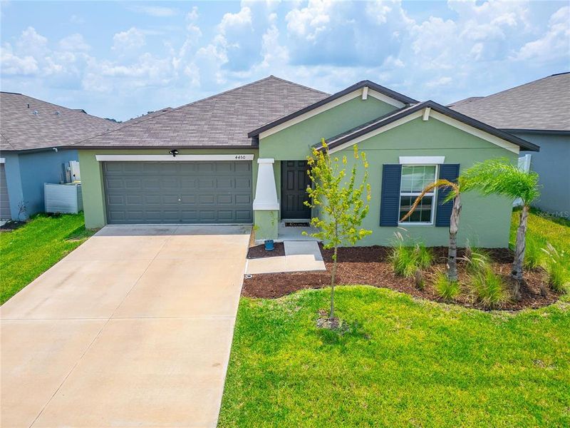 Front exterior of a new home in , Bartow, FL, highlighting curb appeal (Image 29).