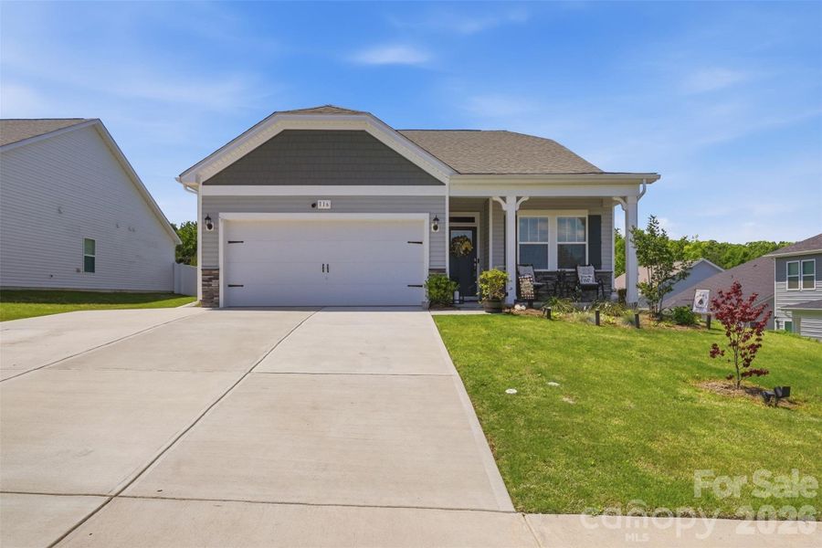 Front exterior of a new home in , Rock Hill, SC, highlighting curb appeal (Image 21).