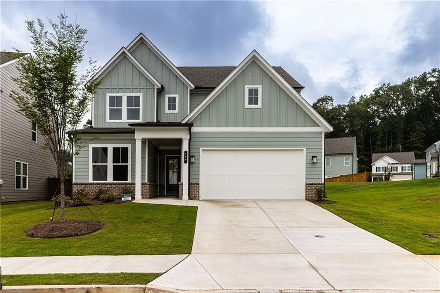 Front exterior of a new home in , Canton, GA, highlighting curb appeal (Image 24).