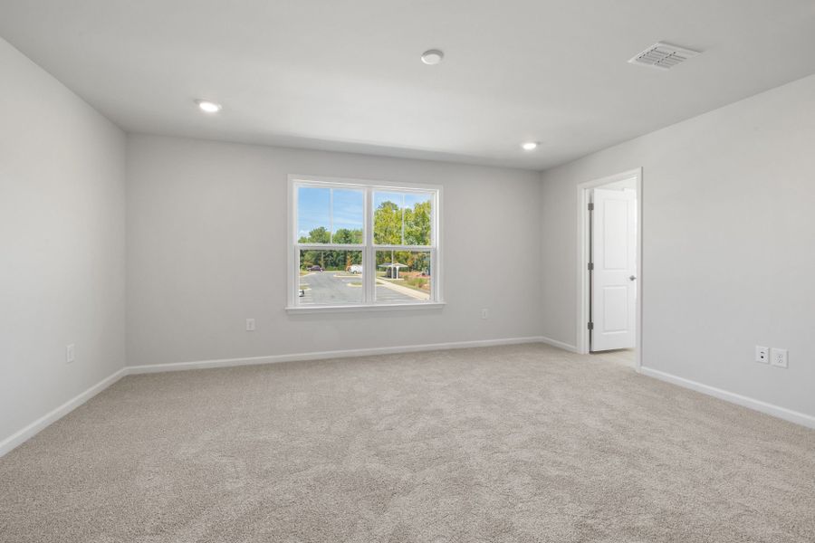 Spacious, unfurnished interior of a new home in Saunders Farm, Willow Spring (Image 28). Spacious, unfurnished interior of a new home in Saunders Farm, Willow Spring (Image 28).
