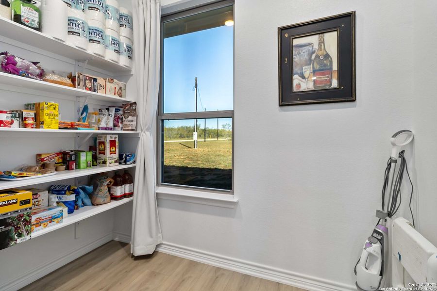 Furnished interior view inside a new home in , Devine (Image 38). Furnished interior view inside a new home in , Devine (Image 38).