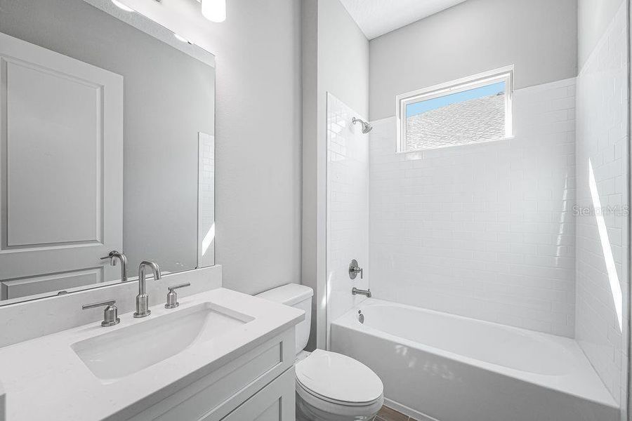 Furnished interior view inside a new home in Esplanade at Center Lake Ranch, St. Cloud (Image 7).