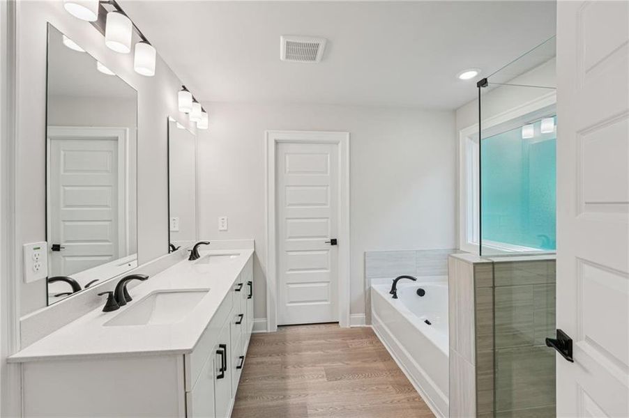 Furnished interior view inside a new home in Hemingway - Reserve Series, Cumming (Image 15). Furnished interior view inside a new home in Hemingway - Reserve Series, Cumming (Image 15).