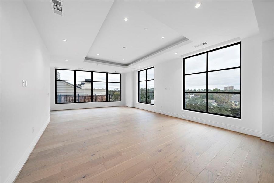 Living room: The exquisite light wood floors enhance the warmth of the room and the foundation for the space.