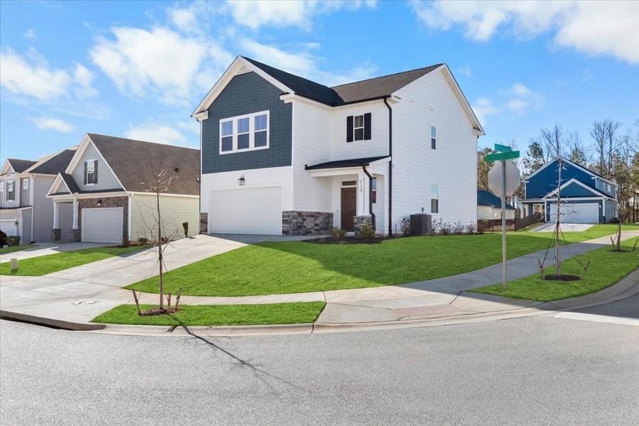 Front exterior of a new home in Tillery Park, Grovetown, GA, highlighting curb appeal (Image 2). Front exterior of a new home in Tillery Park, Grovetown, GA, highlighting curb appeal (Image 2).