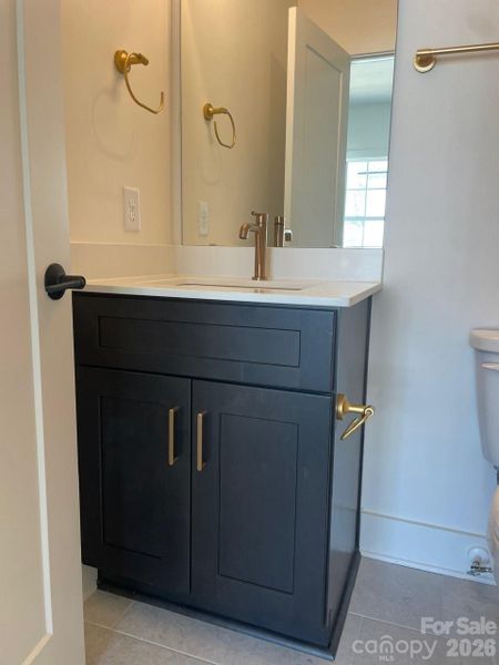 Upgraded gold fixtures - Secondary Bathroom Upgraded gold fixtures - Secondary Bathroom
