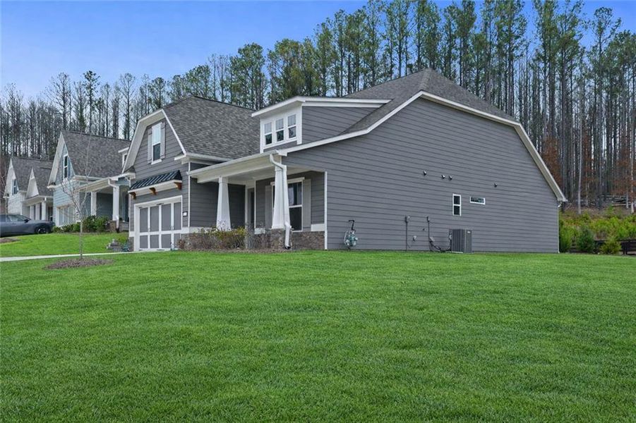 Exterior details and patio area of a home in Stratford at NatureWalk, Dallas (Image 27).