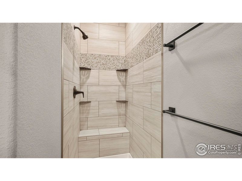 Standing Shower in primary w/bench Standing Shower in primary w/bench