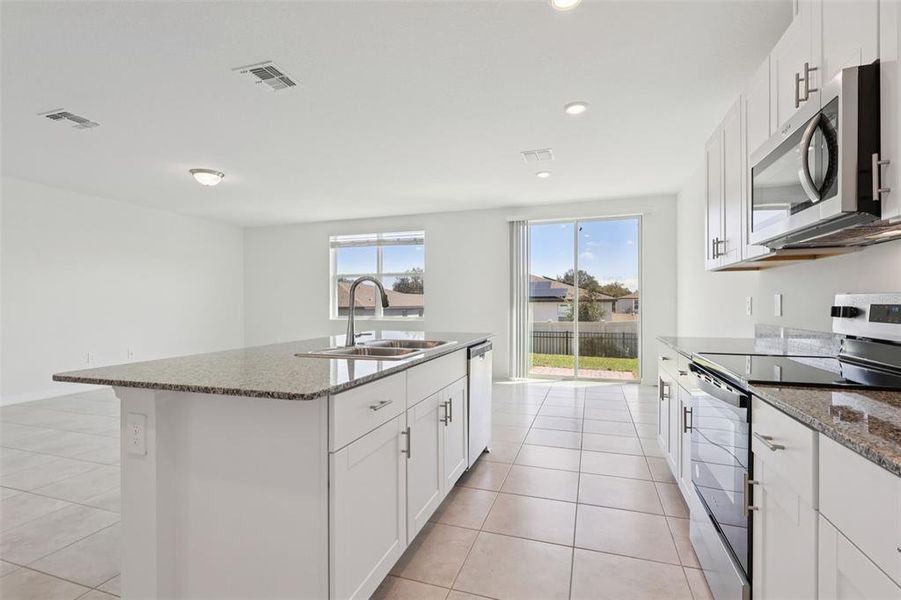 Furnished interior view inside a new home in Deer Run at Crosswinds, Davenport (Image 12).