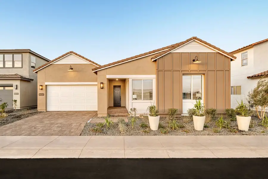 Representative exterior photo of a completed home built from the Violet Plan 5008 by Tri Pointe Homes in Revana at Soleo, Queen Creek, AZ (Image 1).