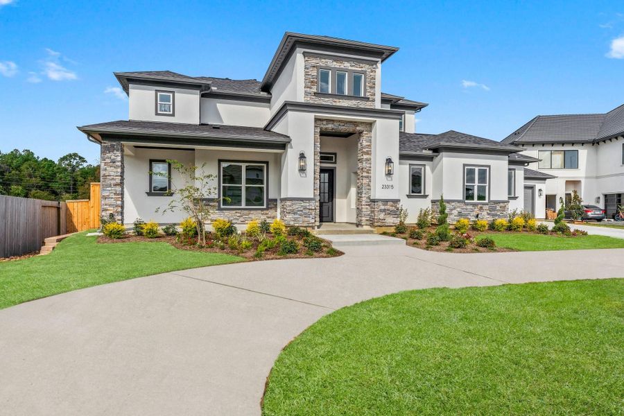 Front exterior of a new home in , Spring, TX, highlighting curb appeal (Image 22). Front exterior of a new home in , Spring, TX, highlighting curb appeal (Image 22).