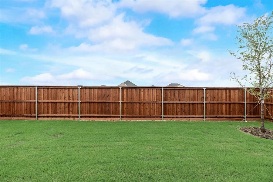 Exterior details and patio area of a home in Spiritas Ranch, Little Elm (Image 2). Exterior details and patio area of a home in Spiritas Ranch, Little Elm (Image 2).