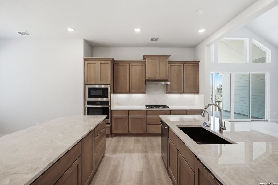Furnished interior view inside a new home in Potranco Oaks, Castroville (Image 17).