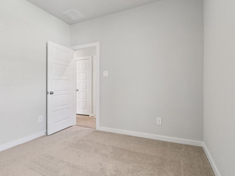 Spacious, unfurnished interior of a new home in Sanford Farms - Traditional Series, Waller (Image 13).
