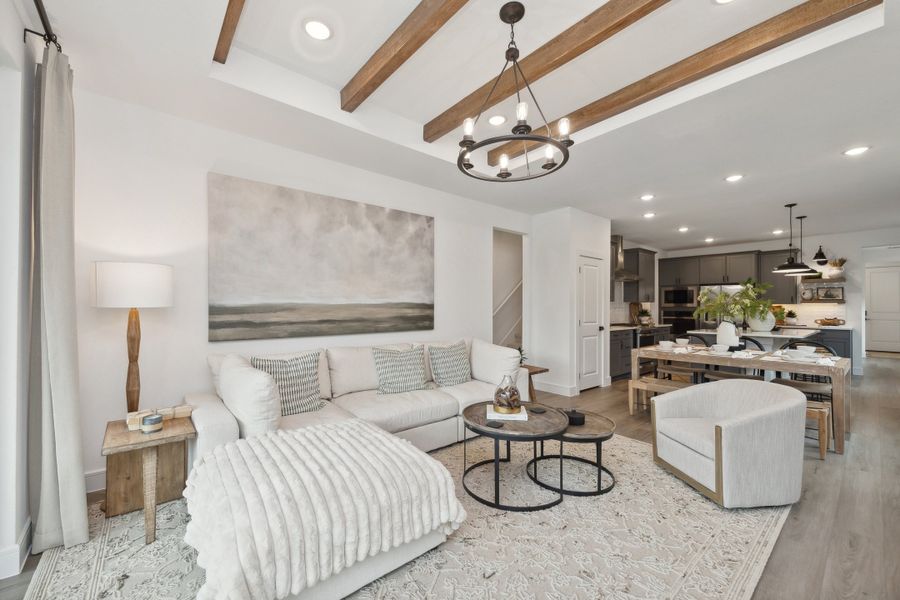 Great room with stained ceiling beams