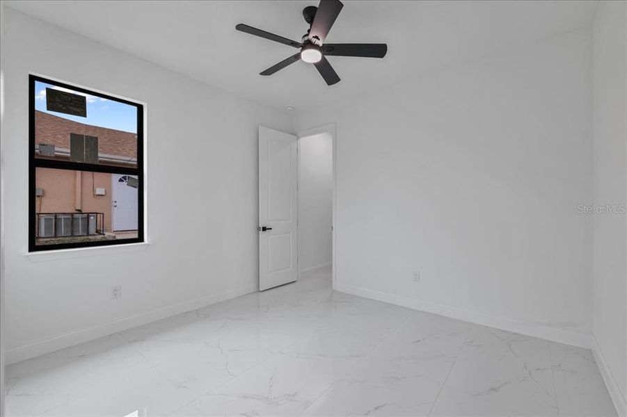 Spacious, unfurnished interior of a new home in , Cape Coral (Image 40).