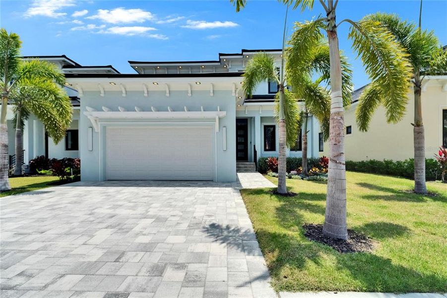 Front exterior of a new home in , Apollo Beach, FL, highlighting curb appeal (Image 19).