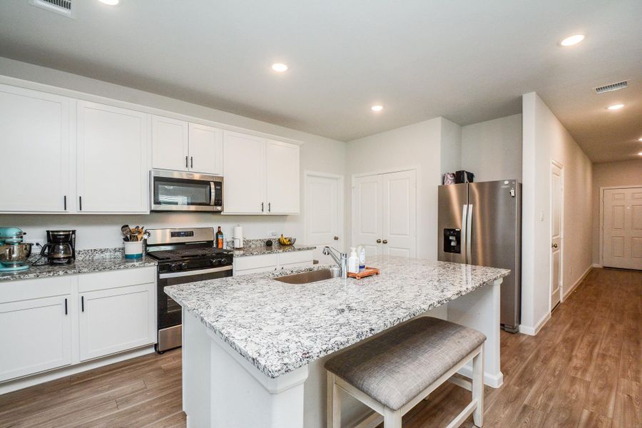 Furnished interior view inside a new home in Granger Pines, Conroe (Image 14).