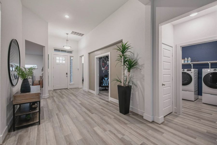 Representative furnished interior of a home built from the Barron by Chesmar Homes in Lariat, Liberty Hill (Image 6).
