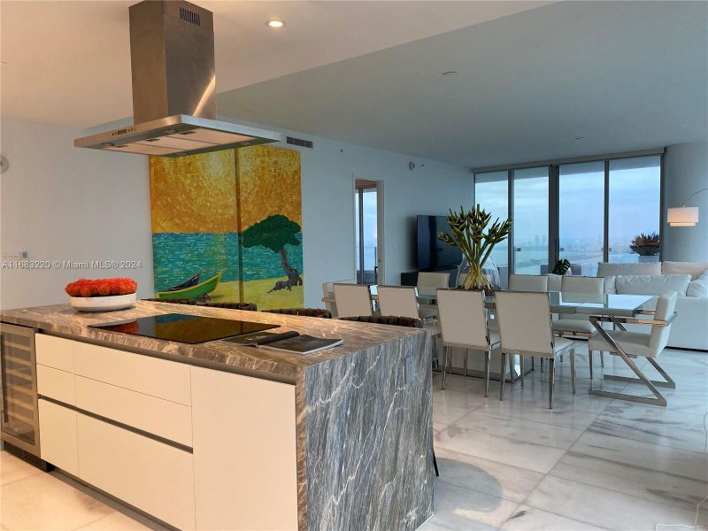 Kitchen View to Dining Area & Bay