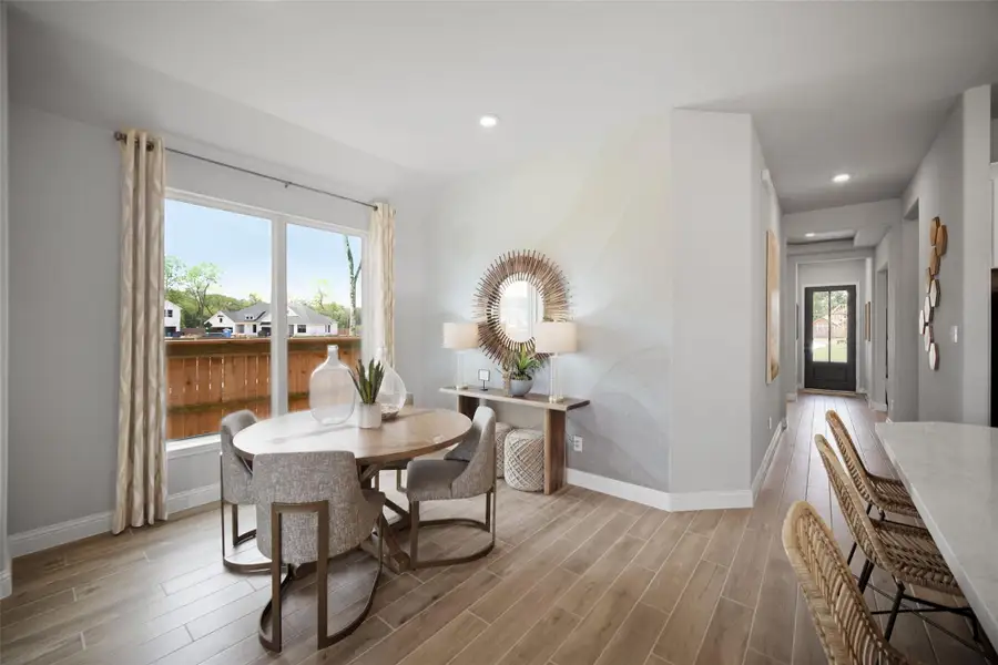 Furnished interior view inside a new home in The Highlands: Highland Duets, Porter (Image 2).