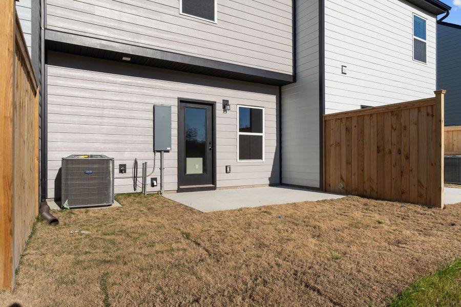 Exterior details and patio area of a home in Oxford Station, Gallatin (Image 17).