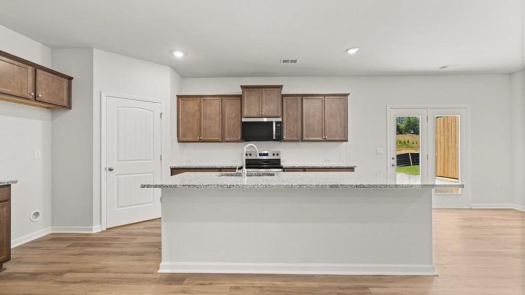 Furnished interior view inside a new home in Village at Pine Valley, Gainesville (Image 6).