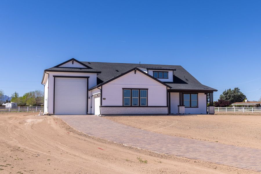 Front exterior of a new home in Heritage Pointe, Chino Valley, AZ, highlighting curb appeal (Image 2).