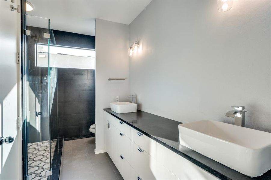 Photos are of unit #204. Unit #101 will feature white cabinets and grey wood floors. Photos are of unit #204. Unit #101 will feature white cabinets and grey wood floors.