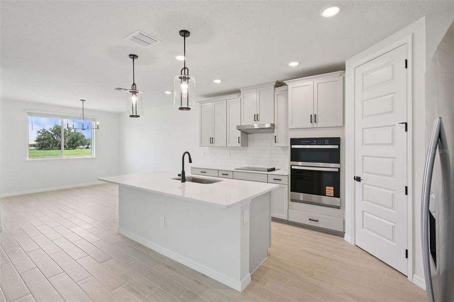 Furnished interior view inside a new home in Two Rivers - Signature Series, Zephyrhills (Image 3).